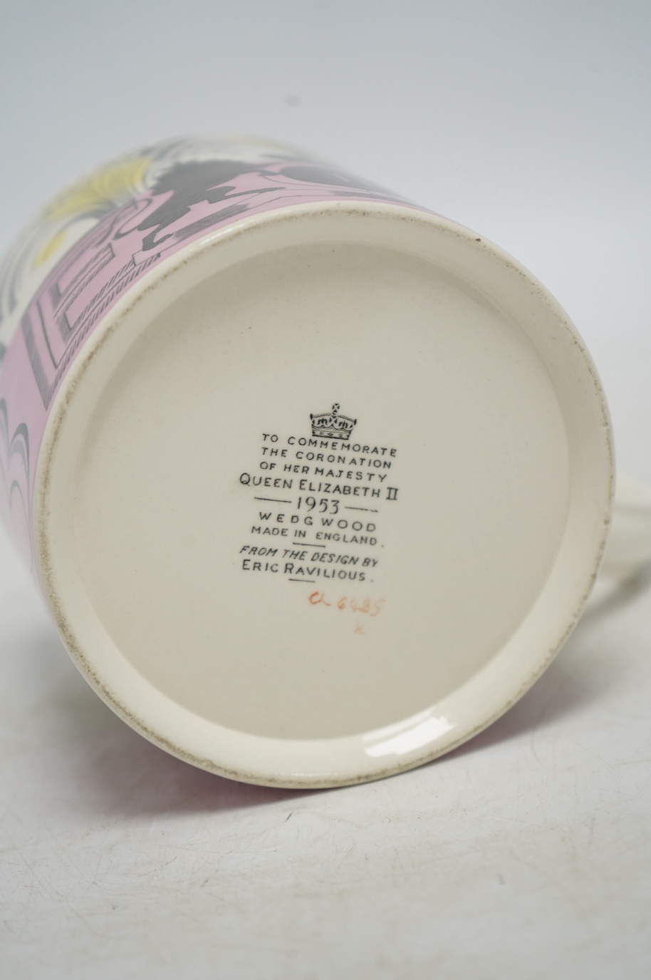 Eric Ravilious for Wedgwood, a 1953 Coronation mug, 10.5cm high, together with a Laura Knight coronation mug. Condition - fair to good